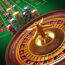 Roulette wheel and casino chips on the table.Similar images: